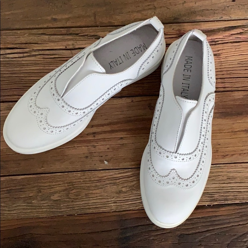 New! White sneakers from Italy.
